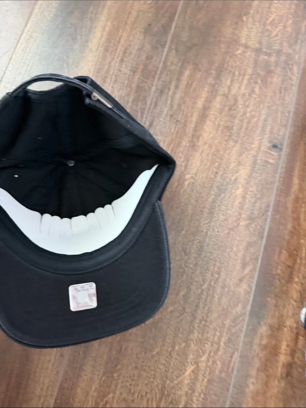 NFL Black Adjustable Hat with Embroidered Shield